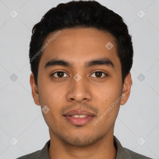 Neutral latino young-adult male with short  black hair and brown eyes