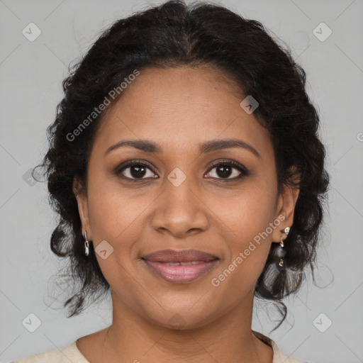 Joyful black young-adult female with medium  brown hair and brown eyes