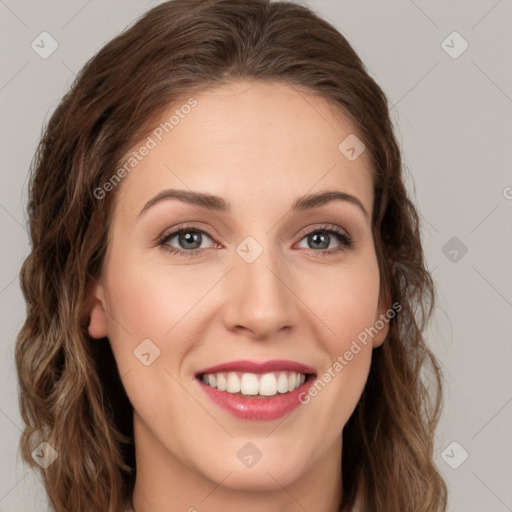 Joyful white young-adult female with long  brown hair and green eyes