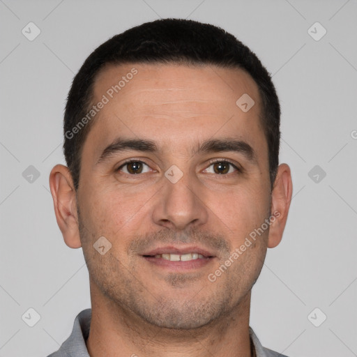 Joyful white young-adult male with short  brown hair and brown eyes