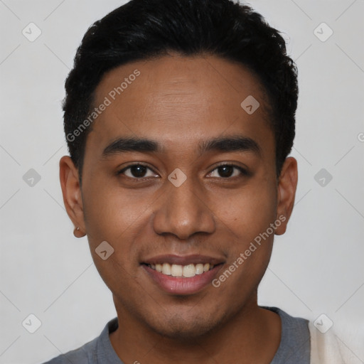 Joyful latino young-adult male with short  black hair and brown eyes