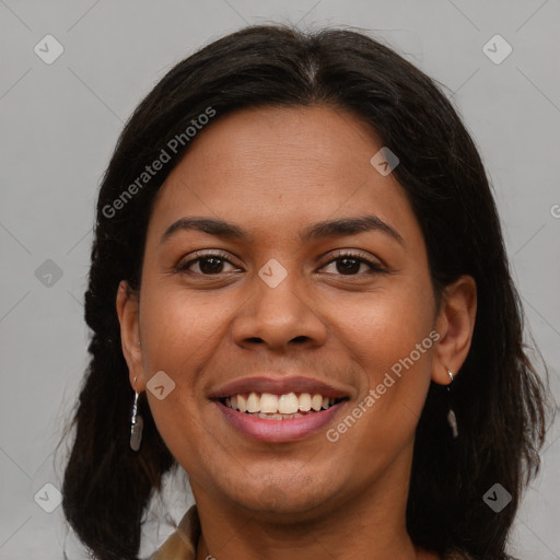 Joyful latino young-adult female with medium  brown hair and brown eyes