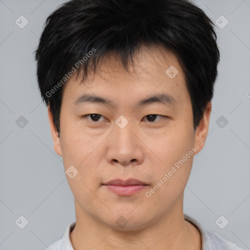 Neutral asian young-adult male with short  black hair and brown eyes