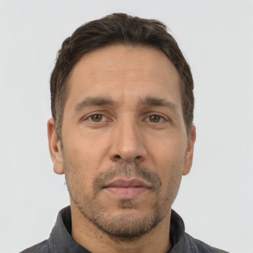 Neutral white adult male with short  brown hair and brown eyes