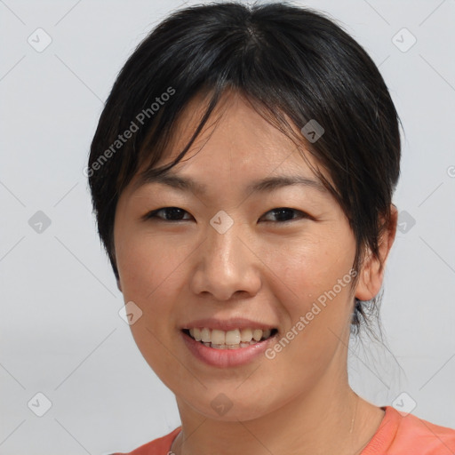 Joyful white young-adult female with medium  brown hair and brown eyes