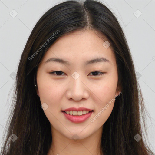 Joyful asian young-adult female with long  brown hair and brown eyes