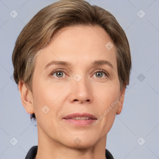 Joyful white adult female with short  brown hair and grey eyes