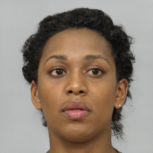 Neutral black adult female with short  brown hair and brown eyes