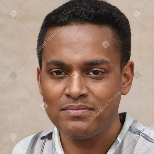 Joyful latino young-adult male with short  brown hair and brown eyes