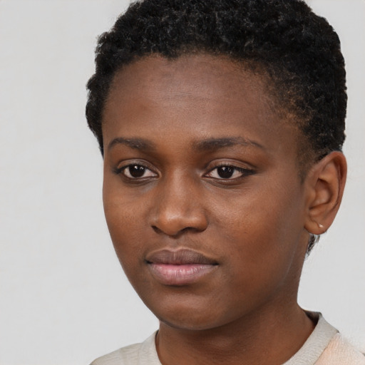 Neutral black young-adult female with short  black hair and brown eyes