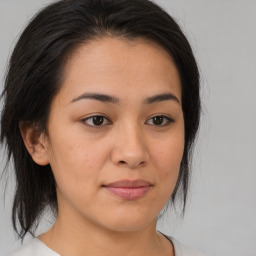 Joyful asian young-adult female with medium  brown hair and brown eyes