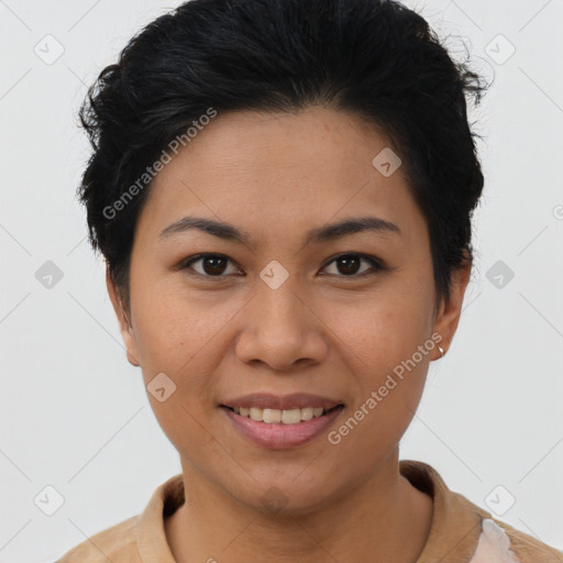 Joyful latino young-adult female with short  brown hair and brown eyes