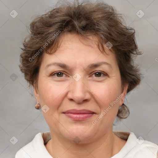 Joyful white adult female with short  brown hair and brown eyes