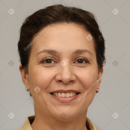 Joyful white adult female with short  brown hair and brown eyes