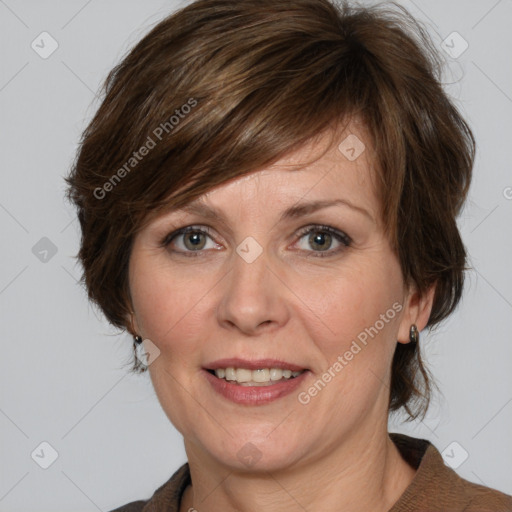 Joyful white adult female with medium  brown hair and grey eyes