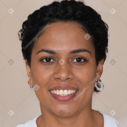 Joyful latino young-adult female with short  black hair and brown eyes