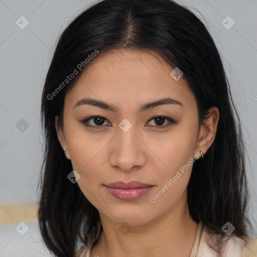 Joyful asian young-adult female with long  brown hair and brown eyes