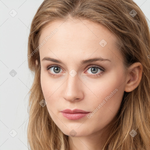 Neutral white young-adult female with long  brown hair and blue eyes