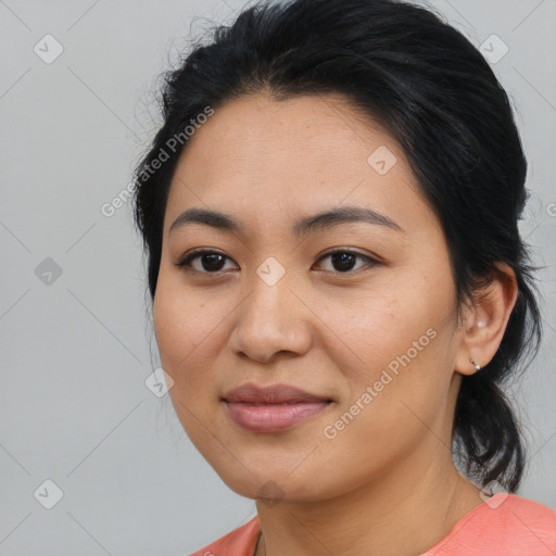 Joyful asian young-adult female with medium  black hair and brown eyes