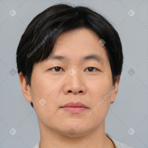 Neutral asian young-adult male with short  brown hair and brown eyes