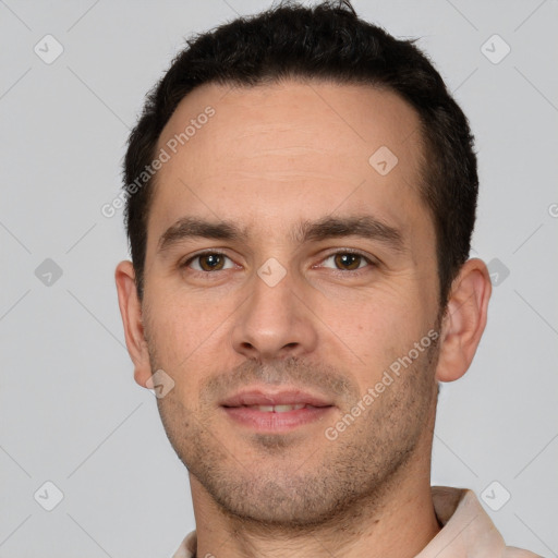 Joyful white young-adult male with short  brown hair and brown eyes