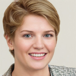 Joyful white young-adult female with medium  brown hair and blue eyes