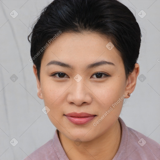 Joyful asian young-adult female with short  brown hair and brown eyes