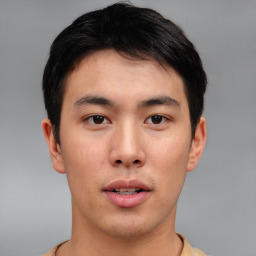 Neutral asian young-adult male with short  brown hair and brown eyes