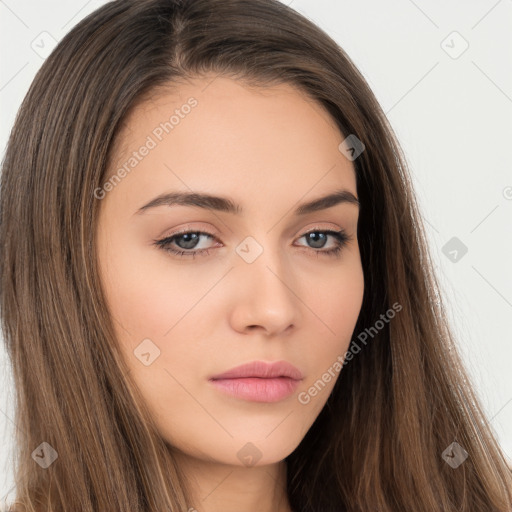 Neutral white young-adult female with long  brown hair and brown eyes