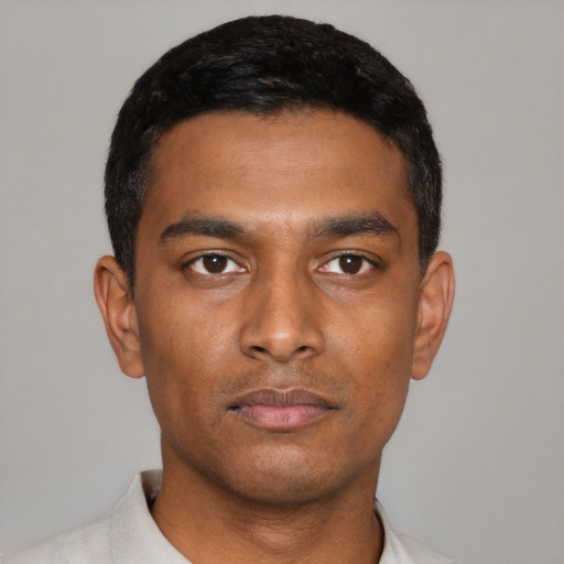 Neutral black young-adult male with short  black hair and brown eyes