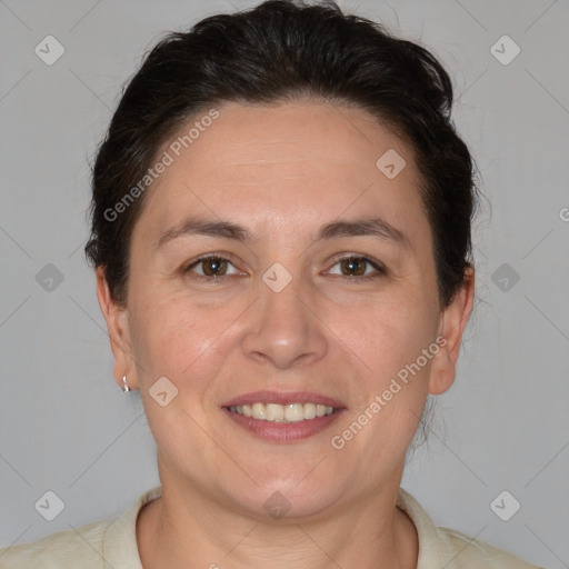 Joyful white adult female with short  brown hair and brown eyes