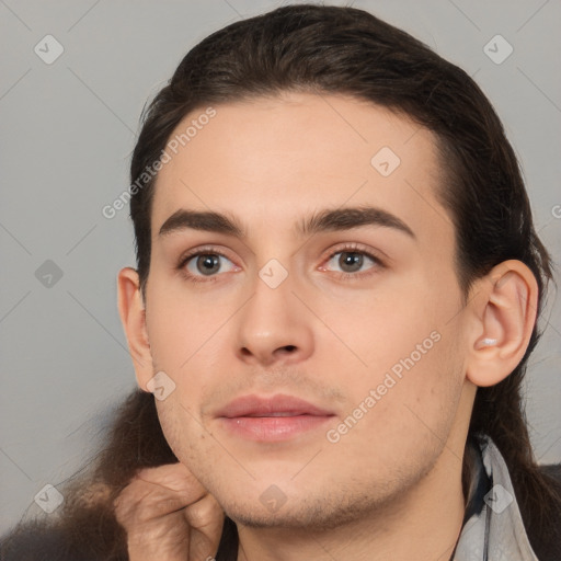 Neutral white young-adult male with medium  brown hair and brown eyes