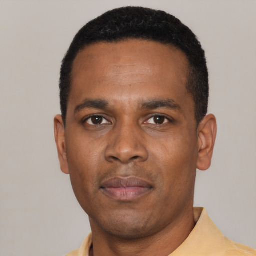 Neutral black young-adult male with short  black hair and brown eyes
