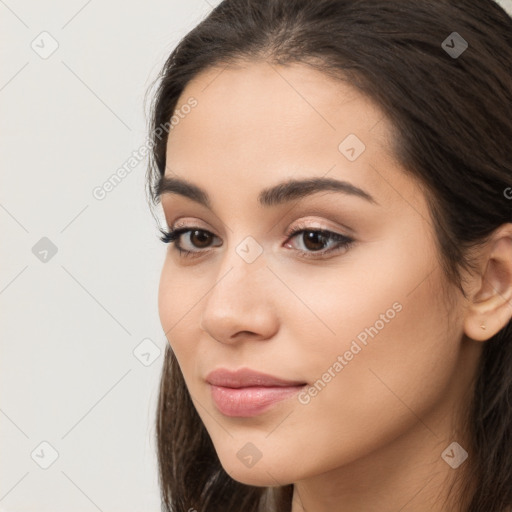 Neutral white young-adult female with long  brown hair and brown eyes