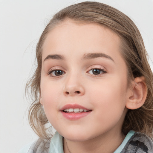 Joyful white child female with medium  brown hair and brown eyes