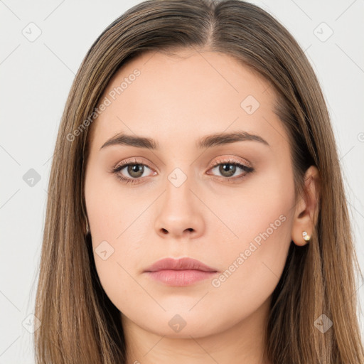 Neutral white young-adult female with long  brown hair and brown eyes