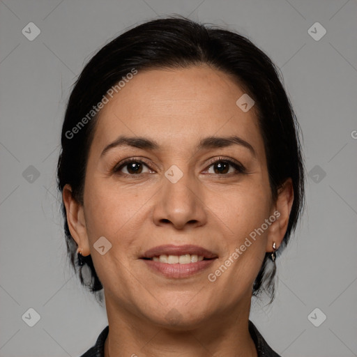 Joyful white adult female with medium  brown hair and brown eyes