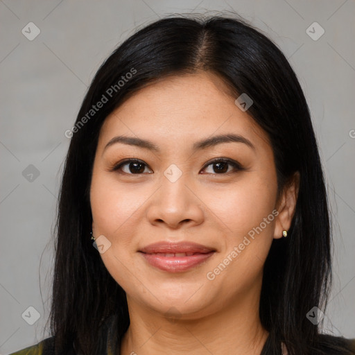 Joyful asian young-adult female with long  brown hair and brown eyes