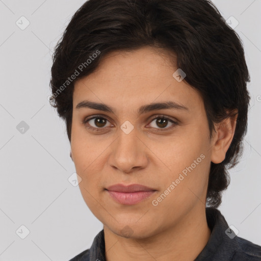 Joyful white young-adult female with medium  brown hair and brown eyes