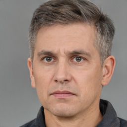 Neutral white adult male with short  brown hair and brown eyes