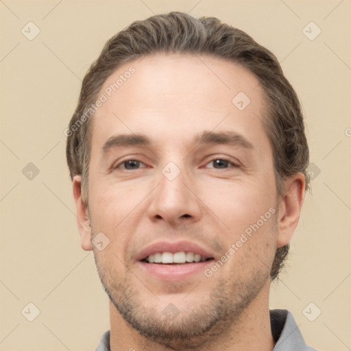 Joyful white young-adult male with short  brown hair and brown eyes