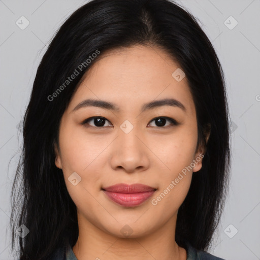 Joyful asian young-adult female with long  brown hair and brown eyes