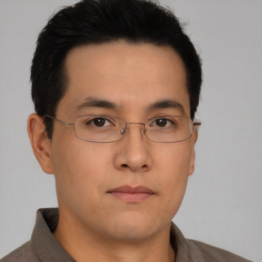 Neutral asian young-adult male with short  brown hair and brown eyes