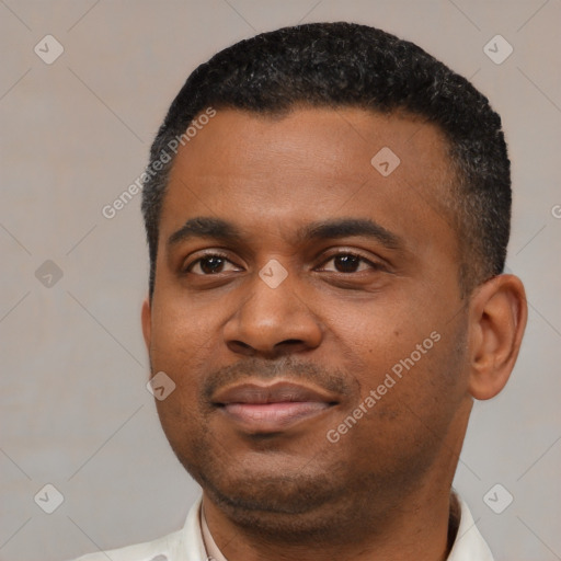 Neutral black young-adult male with short  black hair and brown eyes