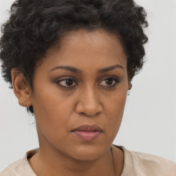 Neutral black young-adult female with short  brown hair and brown eyes