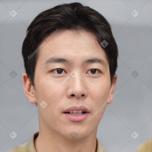 Neutral white young-adult male with short  brown hair and brown eyes