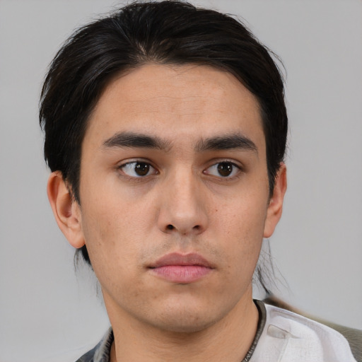 Neutral asian young-adult male with short  brown hair and brown eyes