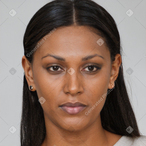 Neutral black young-adult female with long  brown hair and brown eyes