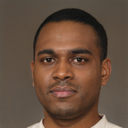 Neutral black young-adult male with short  brown hair and brown eyes