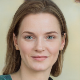 Joyful white young-adult female with medium  brown hair and green eyes